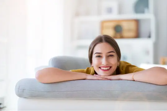 Female laying on couch
