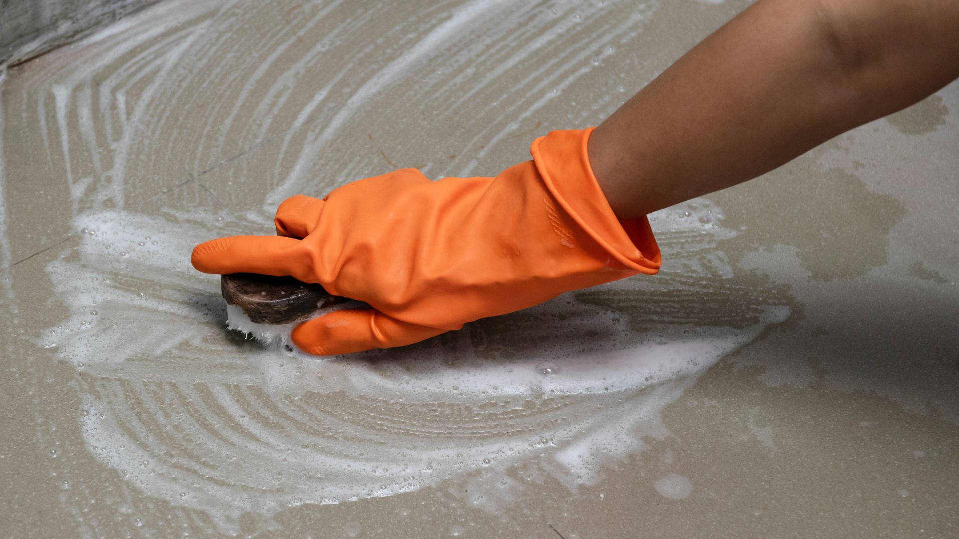 Cleaning kitchen floor tiles