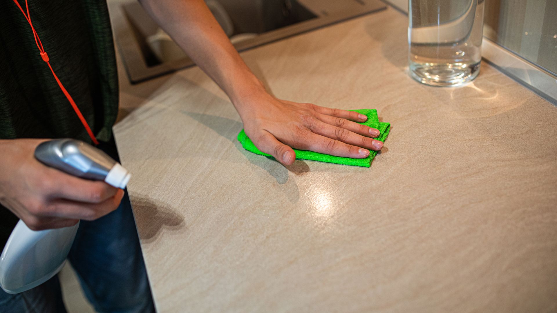 Cleaner wiping the desk